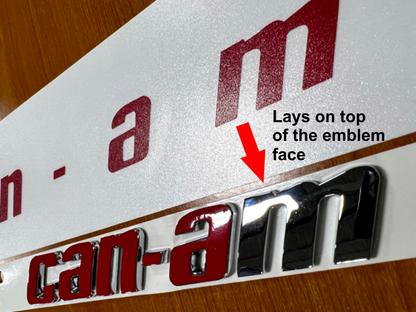 Can-am Spyder F3 vinyl colored text overlays on top of the emblem face